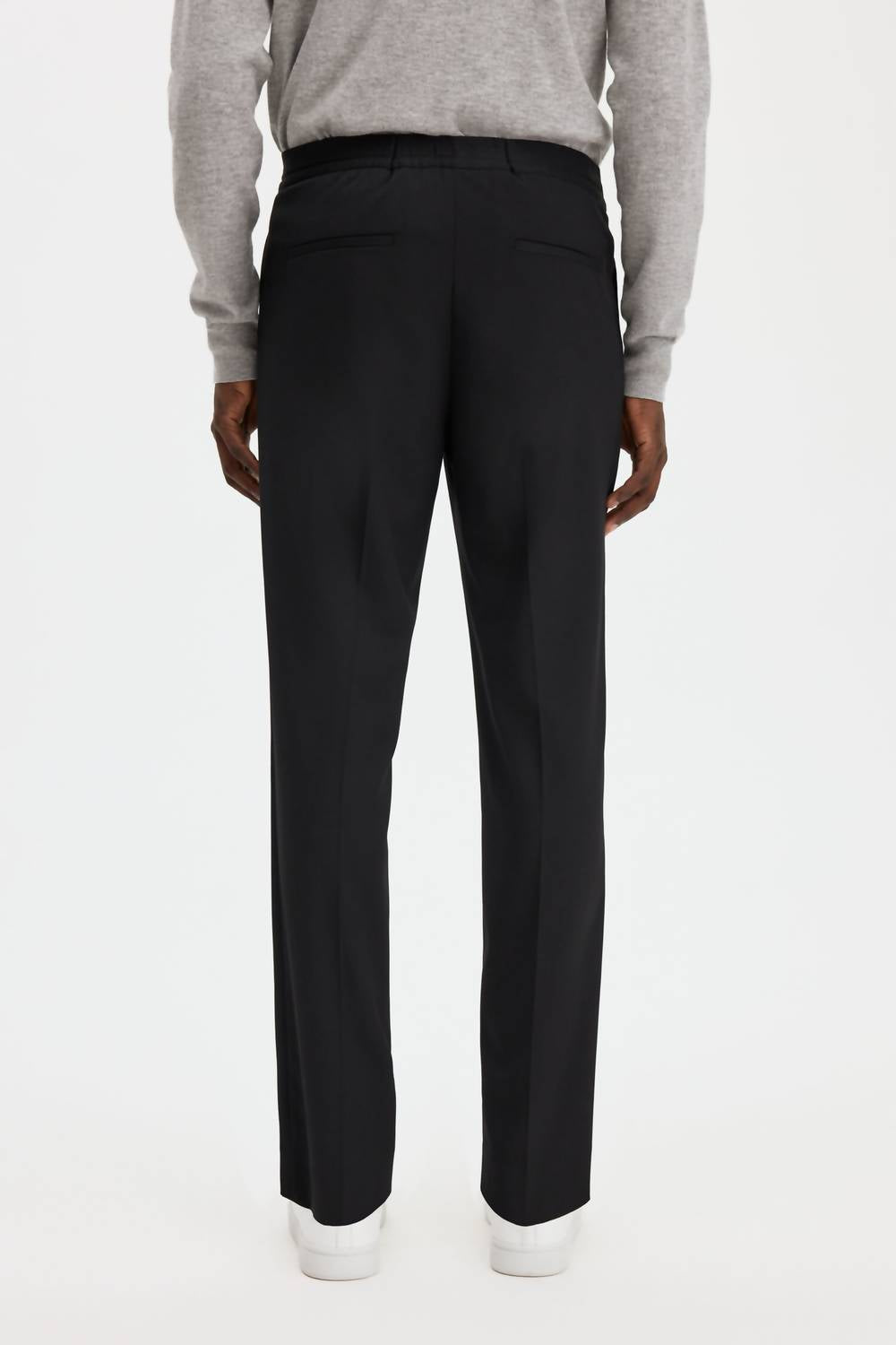 Filippa K Theo Relaxed-fit Wool Trousers in black - men's pants - detail view
