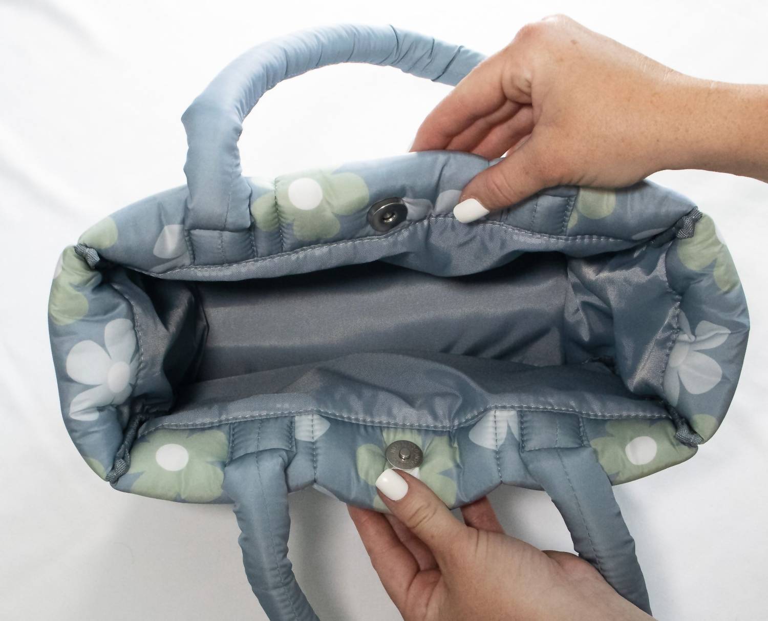 The Care Collective - Daisy Puffer Bag
