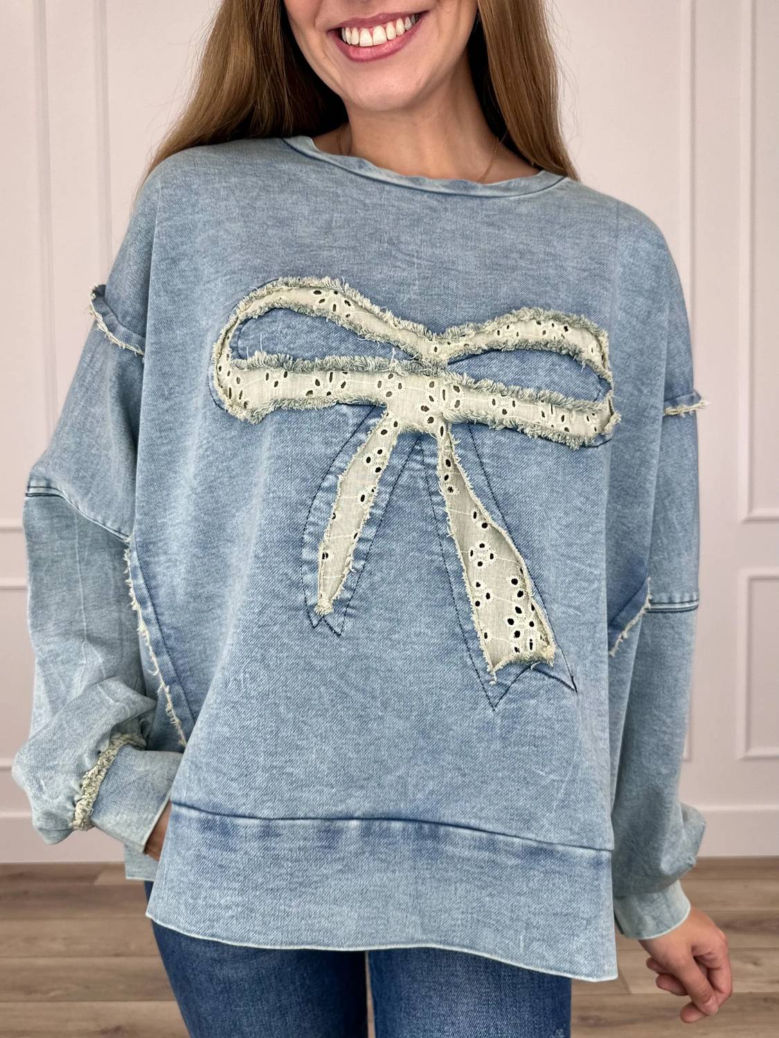 Heimish Usa - Eyelet Bow Applique Raw Edge Sweatshirt