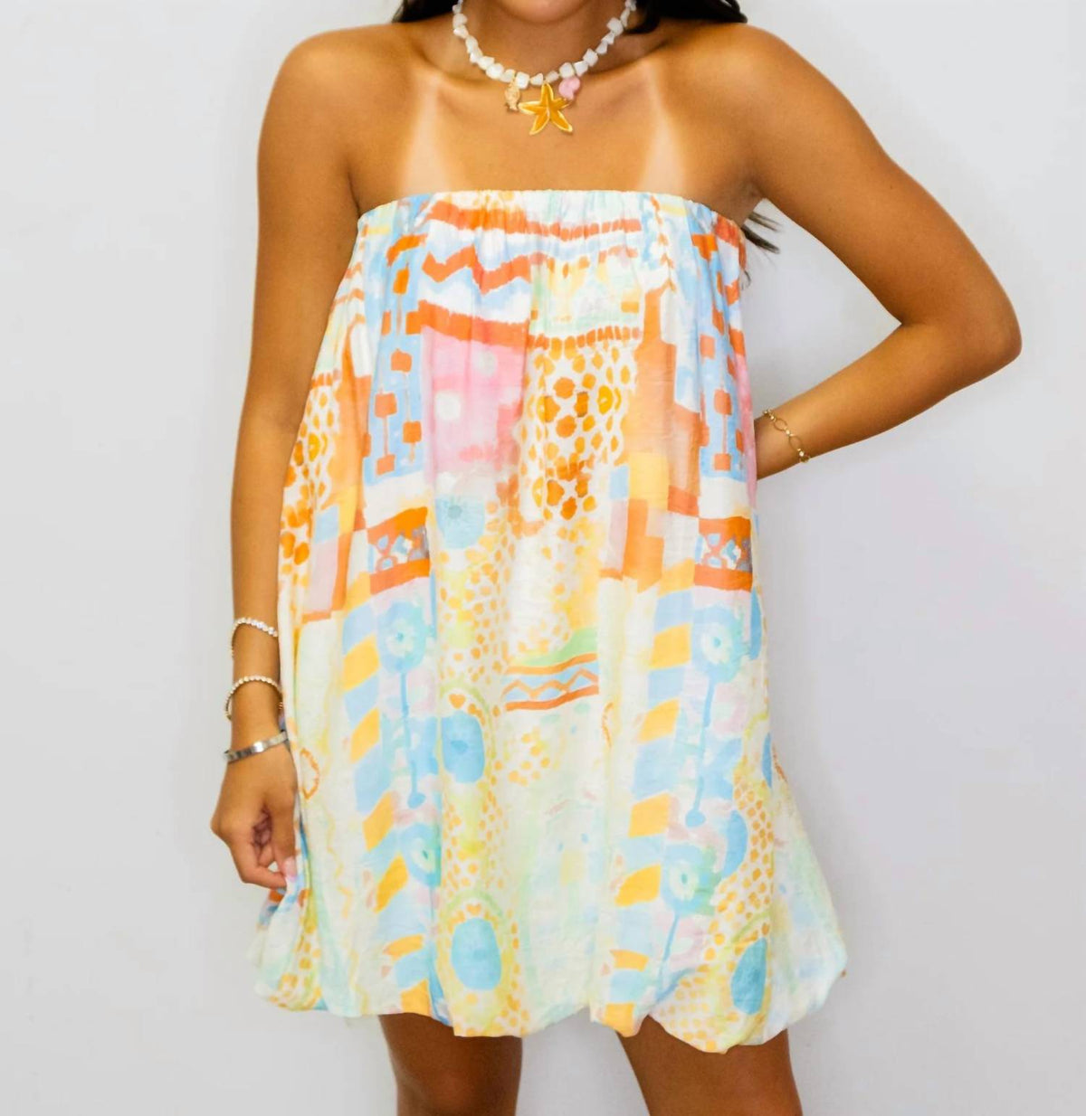 Cozy Co. - Watercolor Bubble Hem Strapless Mini Dress