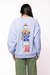 QUEEN OF SPARKLES Skiing Nutcracker Sweatshirt in powder blue - women's top - detail view