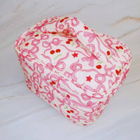 Ellison+Young Women's Cherry Bowtiful Coquette Travel Cosmetic Case in pink - women's bag - detail view