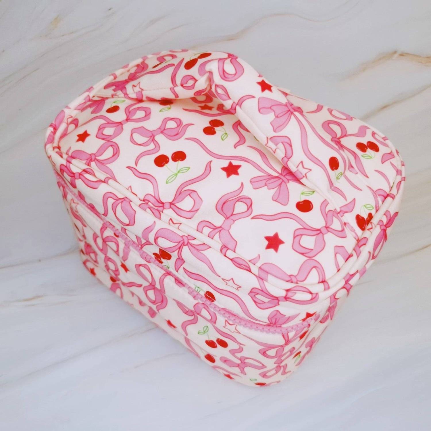 Ellison+Young Women's Cherry Bowtiful Coquette Travel Cosmetic Case in pink - women's bag - detail view