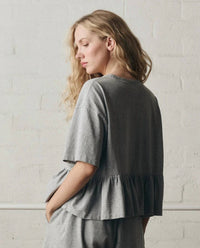 The Great. - Oversized Ruffle Peplum Tee