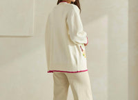 ABLE Embroidered V-neck Cardigan in cream red - women's cardigan - detail view