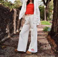 Katie J NYC Girl's Tanner Lips Sweatpants in vintage white - kids' joggers - detail view