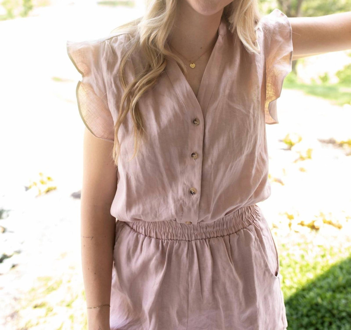 GRADE & GATHER Breezy Elegance Ruffle Linen Romper in pink - women's pants - detail view