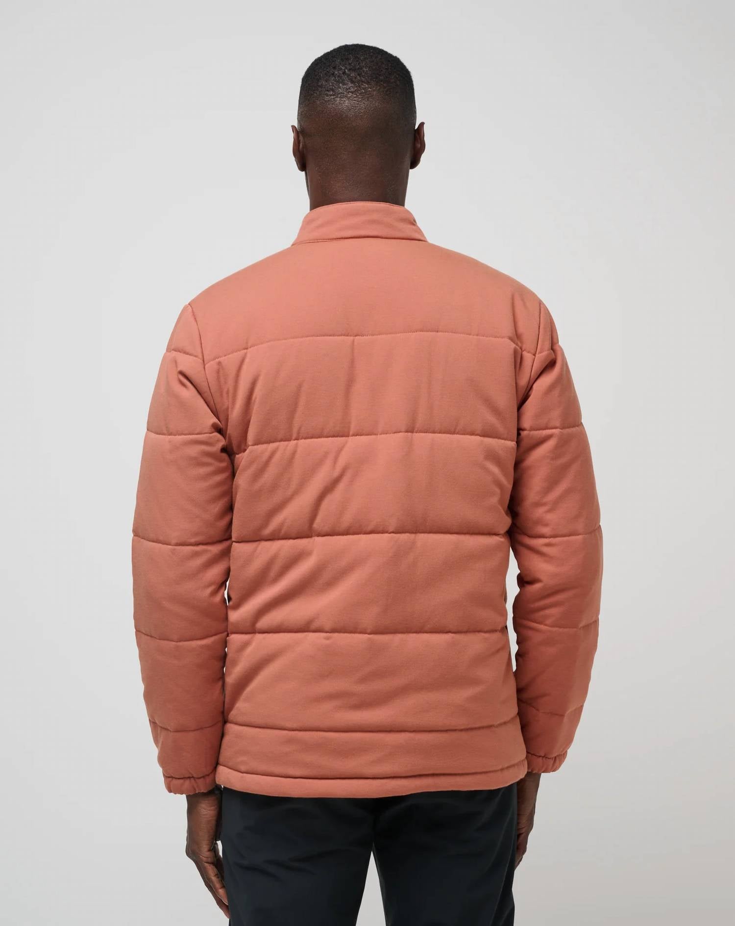 TravisMathew Climate Drop Jacket in heather copper - men's jacket - detail view