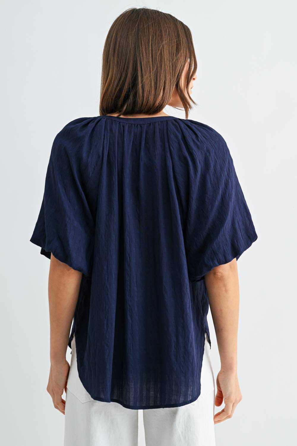 Fun 2 Fun Shiloh Texture Balloon Sleeve Blouse in navy - women's blouse - detail view