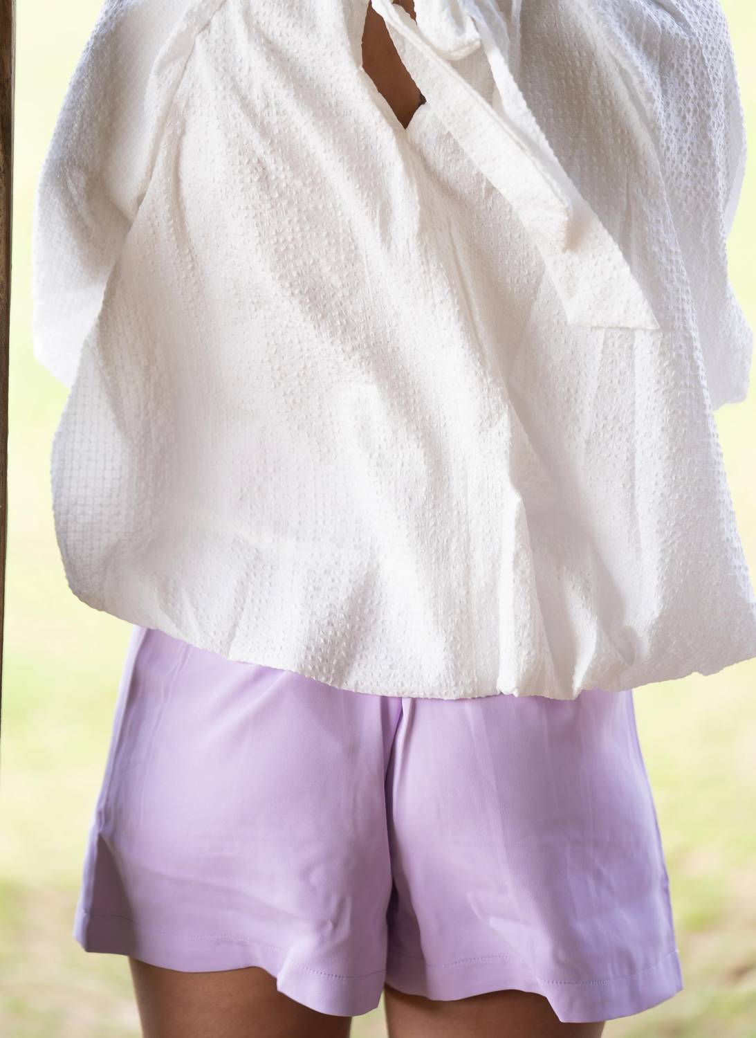 Anniewear - Bubble Hem Bow Top