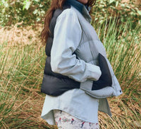 THE GREAT. Polar Vest in navy colorblock - women's jacket - detail view