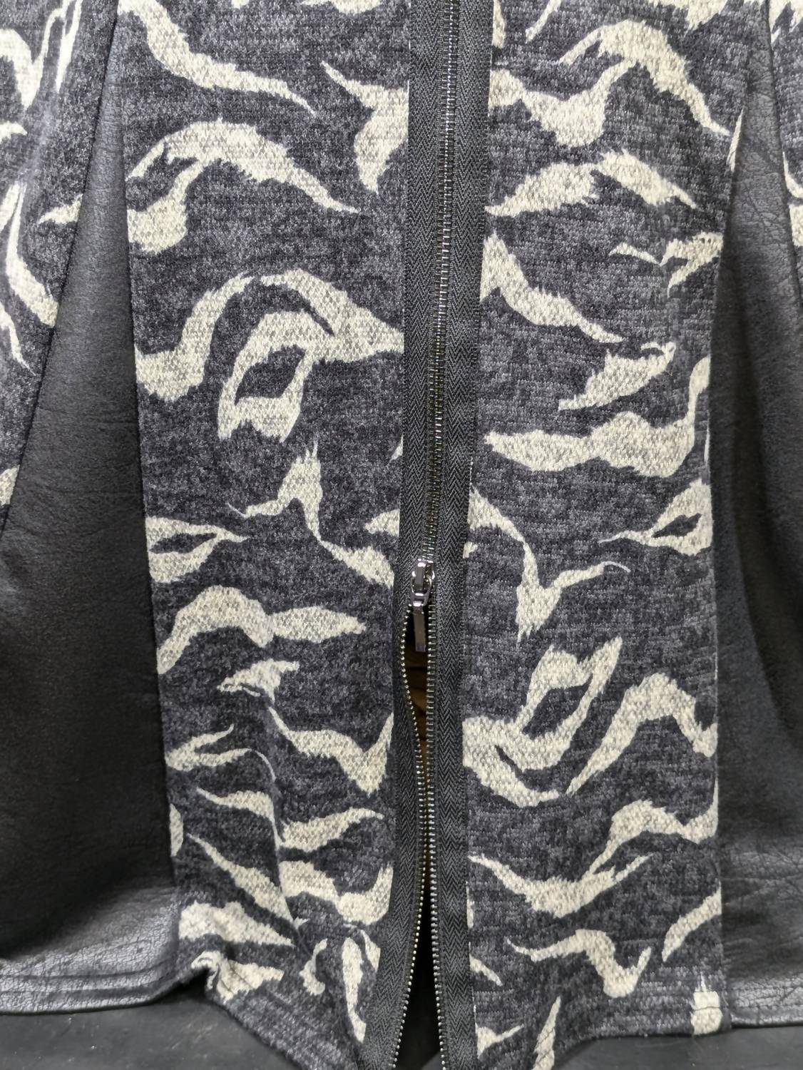 Michael Tyler Women's Sleeveless Zebra Knit Vest in black - women's jacket - detail view