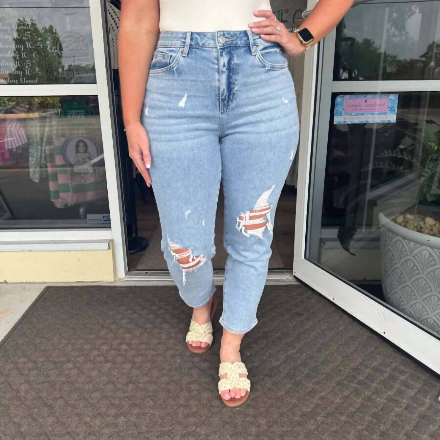 mica denim High Rise Distressed Mom Jeans in light blue - women's jeans