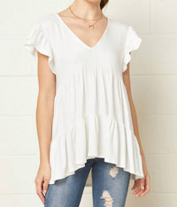 entro Tiered Ruffle Babydoll Top in ivory - women's blouse