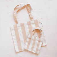 IMANI COLLECTIVE Striped mommy and me tote in pink natural - women's bag - detail view