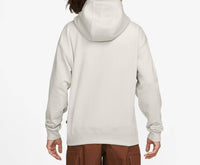 NIKE Sb Oval Logo Fleece Pullover Hoodie in light bone deep jungle - men's shirt - detail view