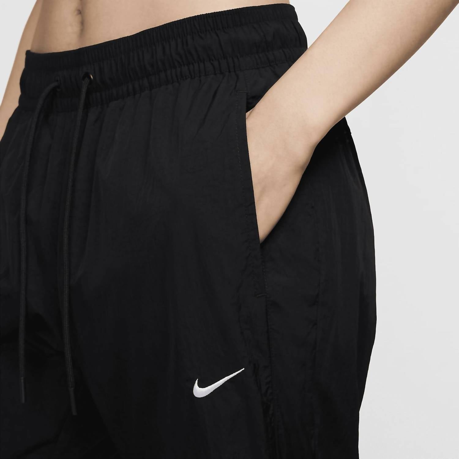 Nike - Women's Mid Rise Repel Zip Pants