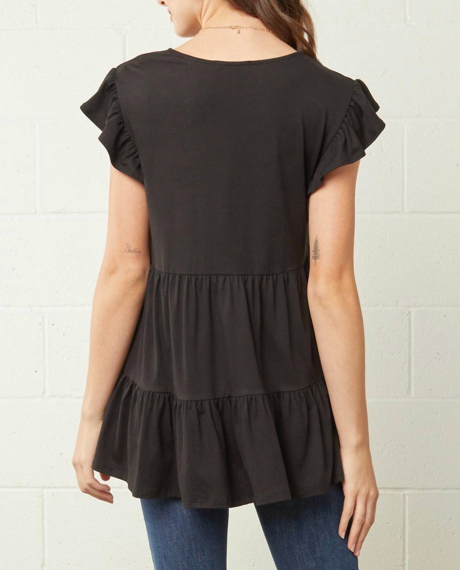 entro Tiered Ruffle Babydoll Top in black - women's blouse - detail view