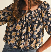 AnnieWear Flower Print Balloon Hem Square Neck Blouse in black butter - women's blouse - detail view