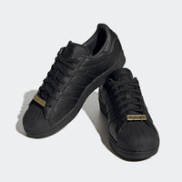 adidas Men's Carbon Low Top Leather Comfort Lace Up Sneaker in black - men's sneaker