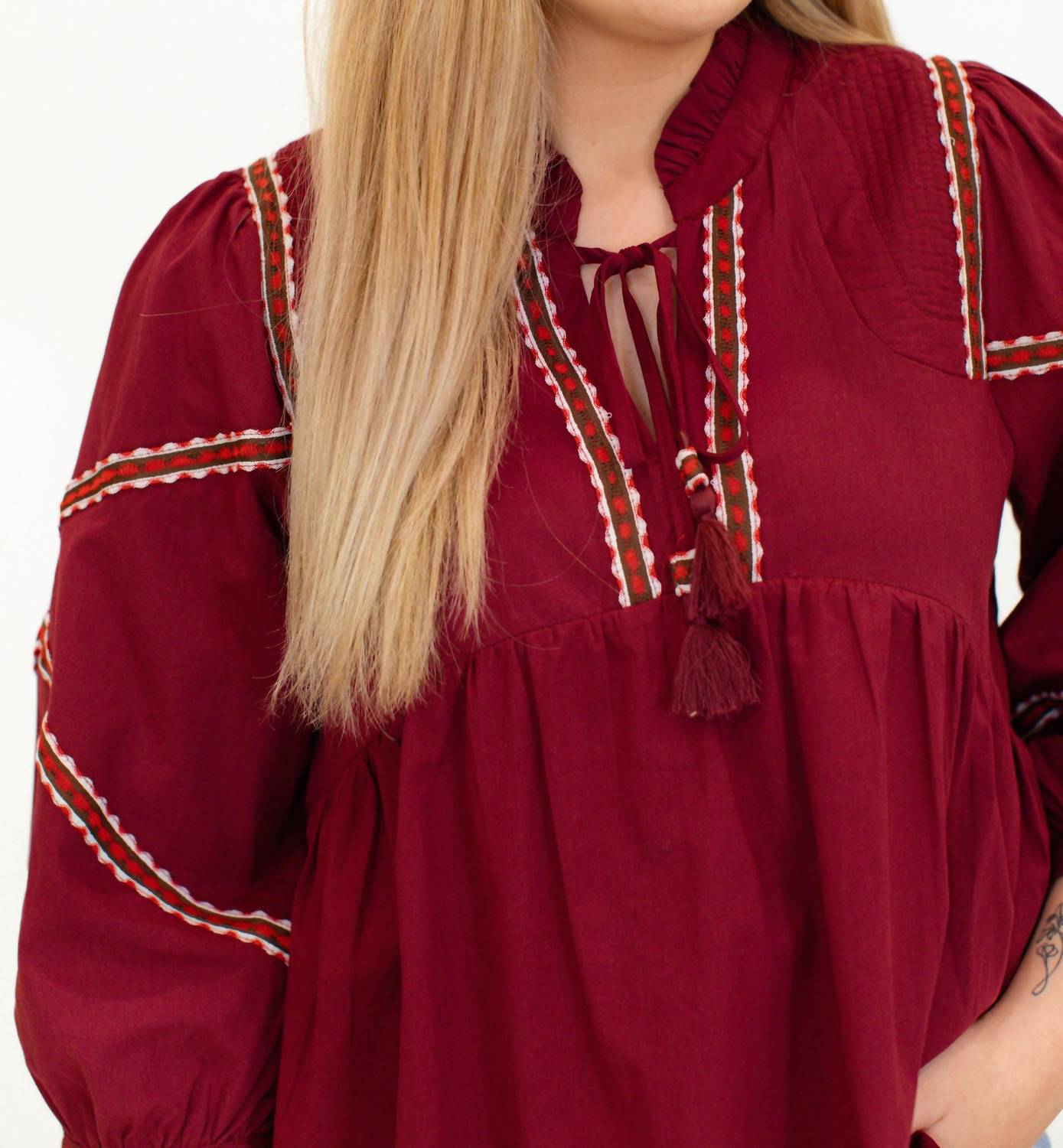 &merci Embroidered Trim Babydoll Blouse in burgundy - women's blouse - detail view