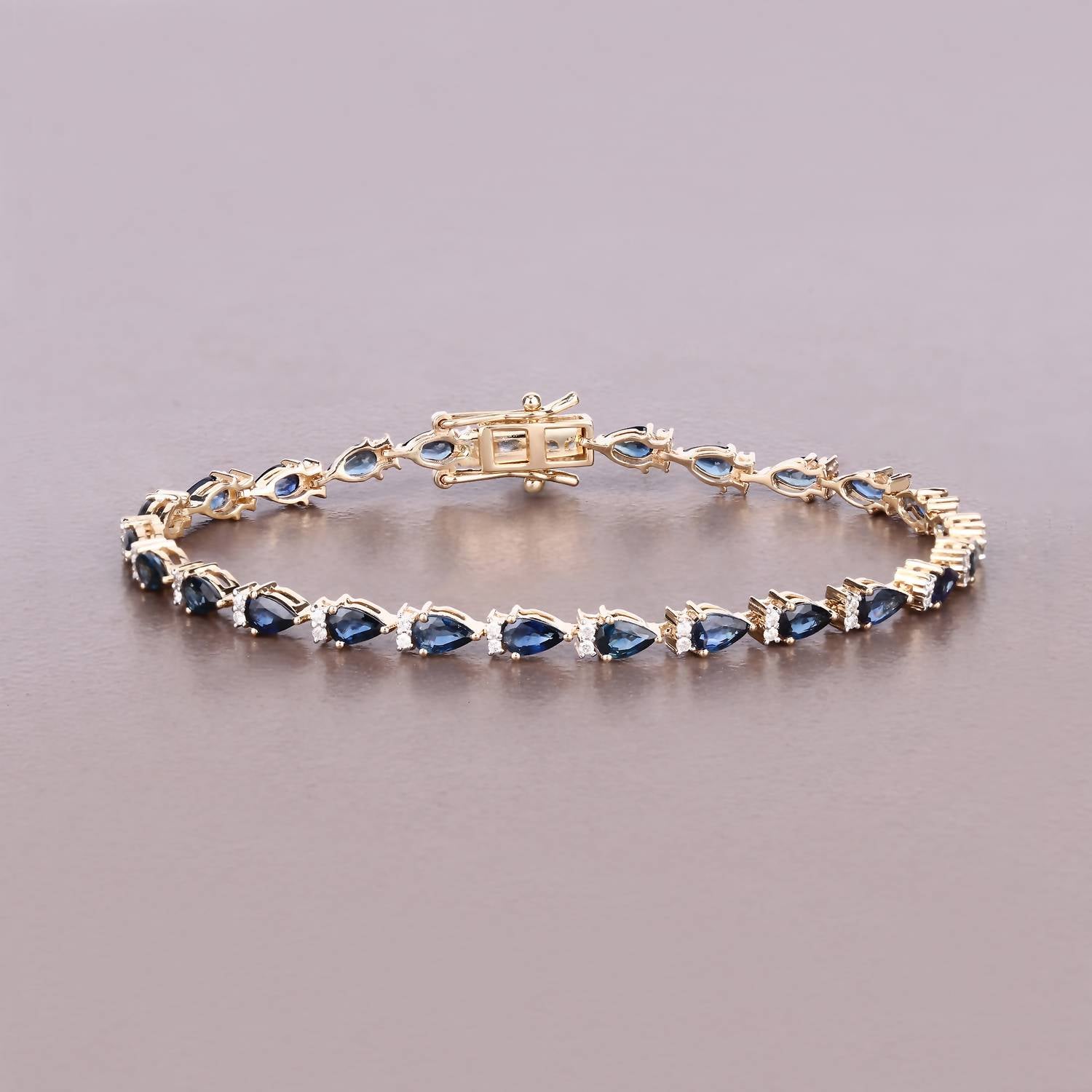 Diana M Jewels Women's Pear Natural Blue Sapphire Bracelet (5.40 Ct) - Elegant in 14k yellow gold - women's jewelry - detail view