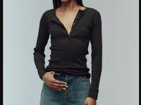 THE GREAT. The Baby Rib Henley Top in black - women's long sleeve top