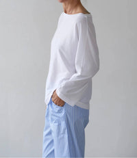 DONNI. Jersey Relaxed Boatneck Top in powder - women's long sleeve top - detail view