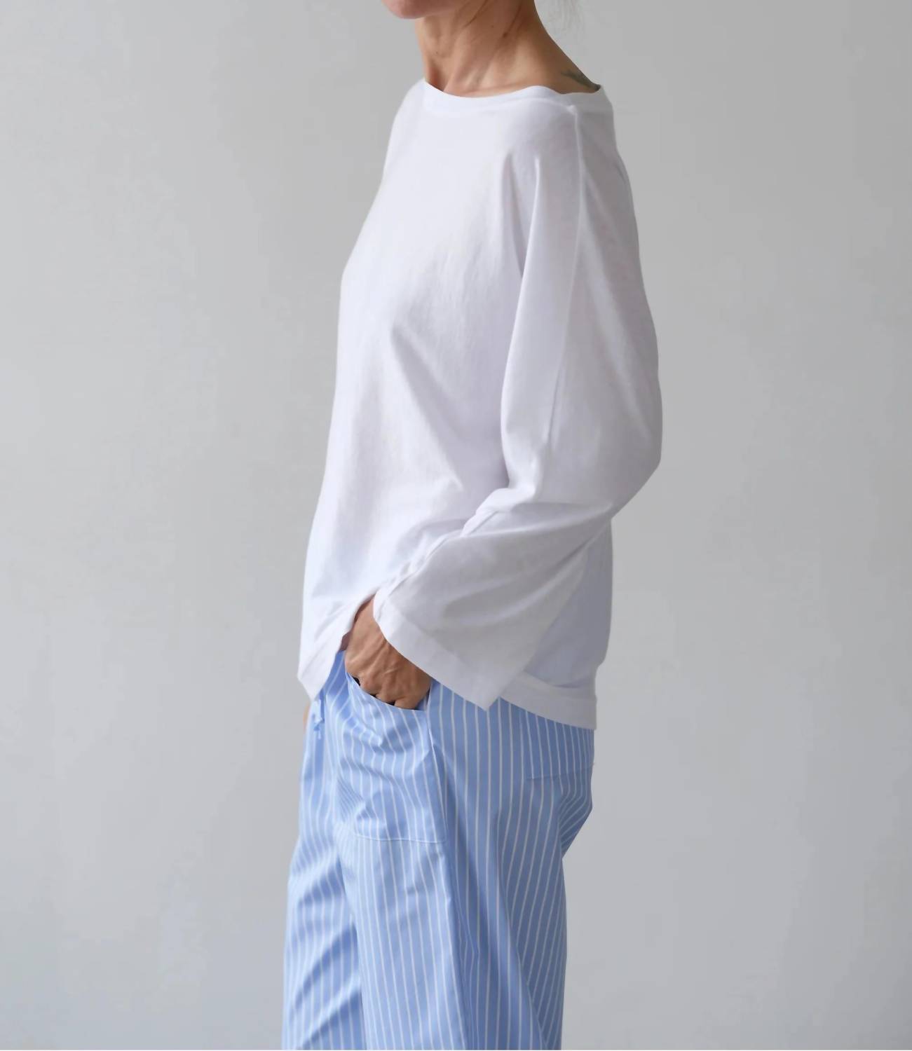DONNI. Jersey Relaxed Boatneck Top in powder - women's long sleeve top - detail view