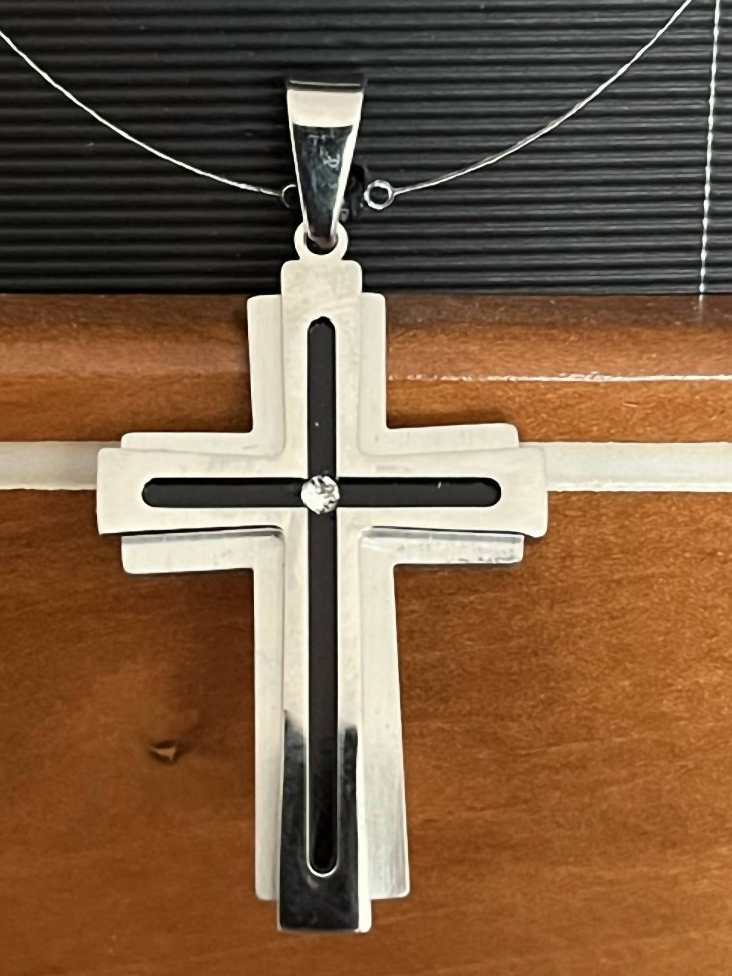 FAIRE TWO-TONE STAINLESS CROSS -UNISEX in silver - women's item