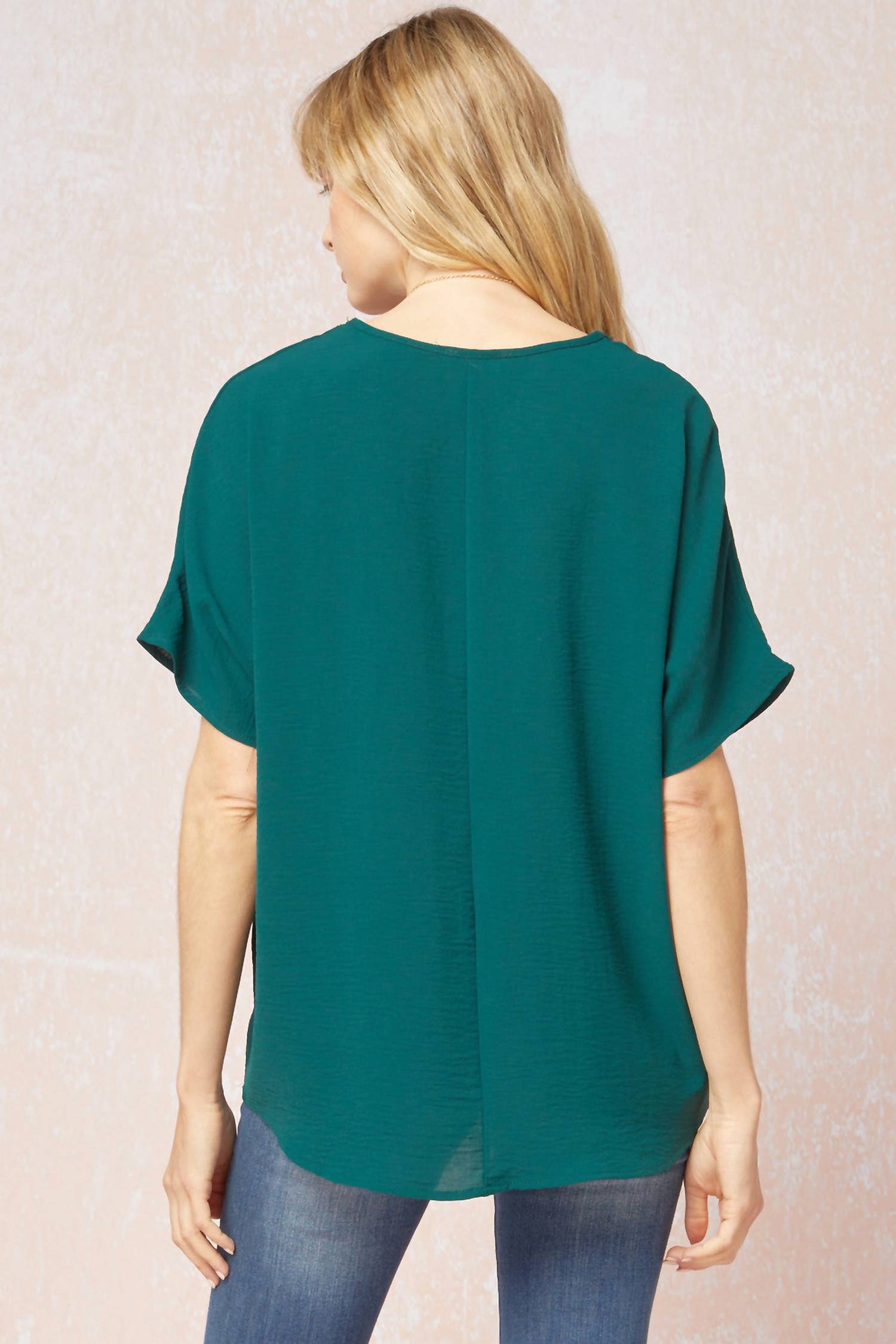 entro Solid V-neck Top in hunter green - women's blouse - detail view