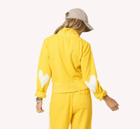 KERRI ROSENTHAL ZIP UP MOCK NECK SWEATSHIRT in golden yellow - women's top - detail view