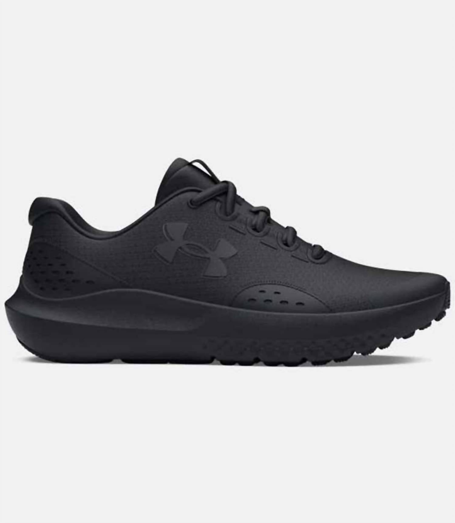 UNDER ARMOUR Boy's Surge 4 Running Shoes in black - kids' sneaker
