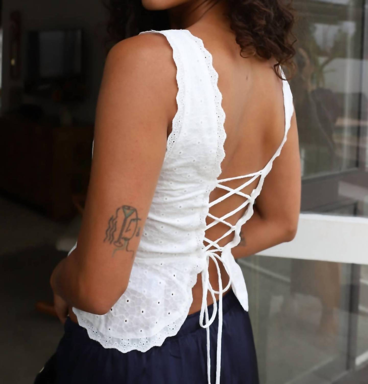 NIA Logan Peplum Top in off white - women's blouse - detail view