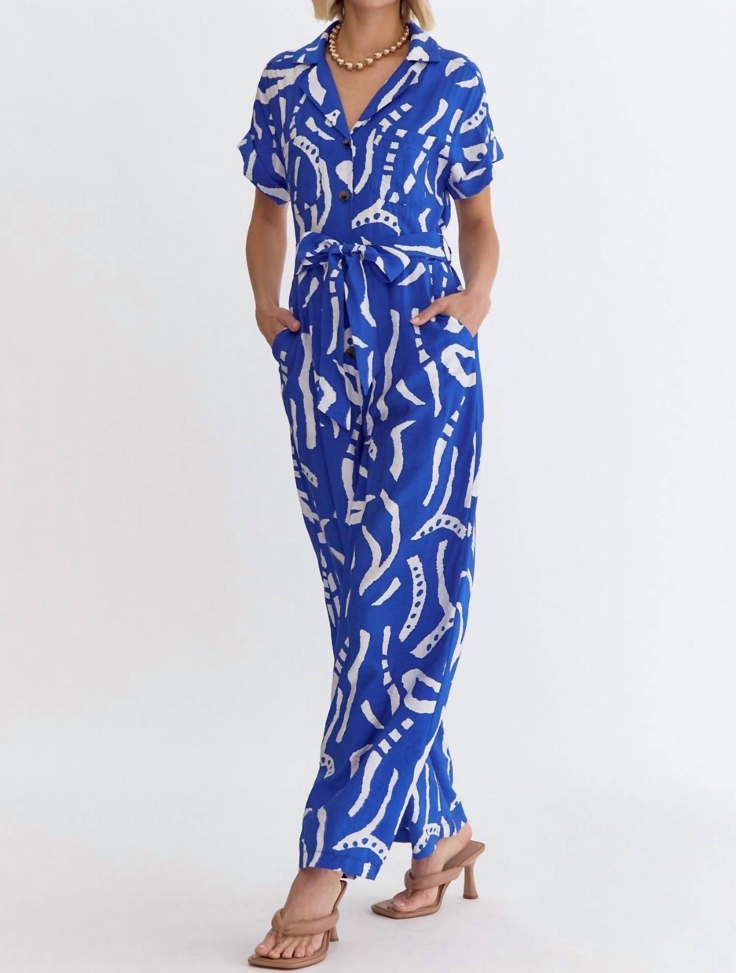 Entrousa V-neck Collared Button Up Jumpsuit in blue zebra - women's pants