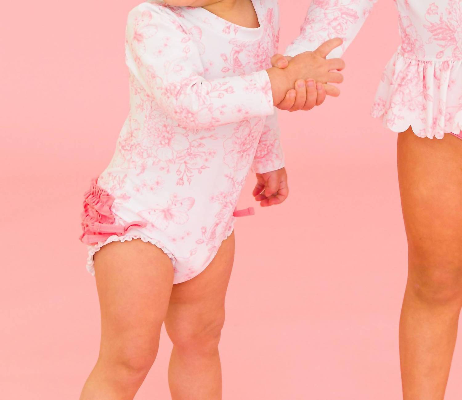 Rufflebutts - Butterfly Garden Toile Long Sleeve One Piece Ruffle Rash Guard Swimsuit