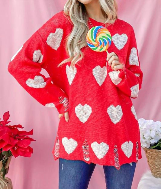 DISTRESSED SWEATER WITH HEARTS