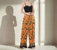 The Sang - Pleated Palazzo Pants