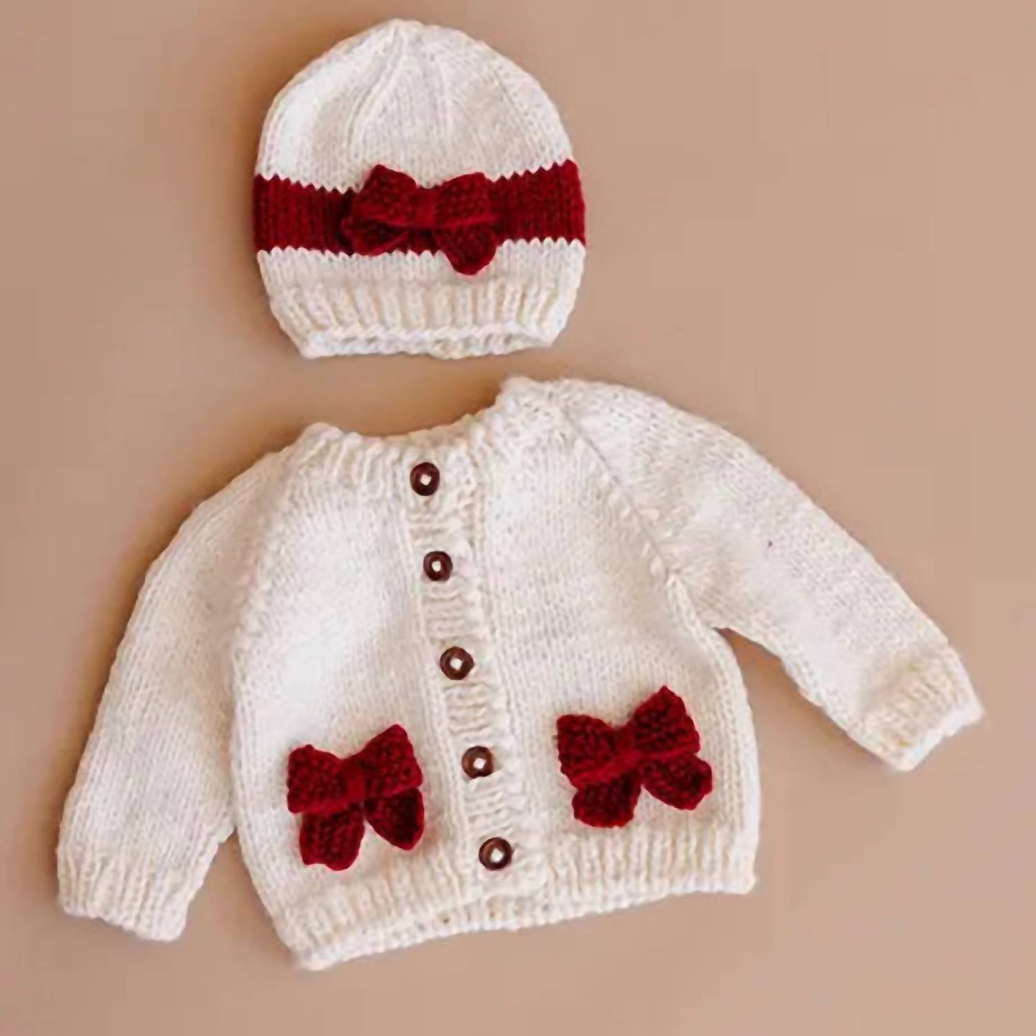 The Blueberry Hill Kid's Cozy Knit Cardigan With Bow in cream red - kids' sweater - detail view