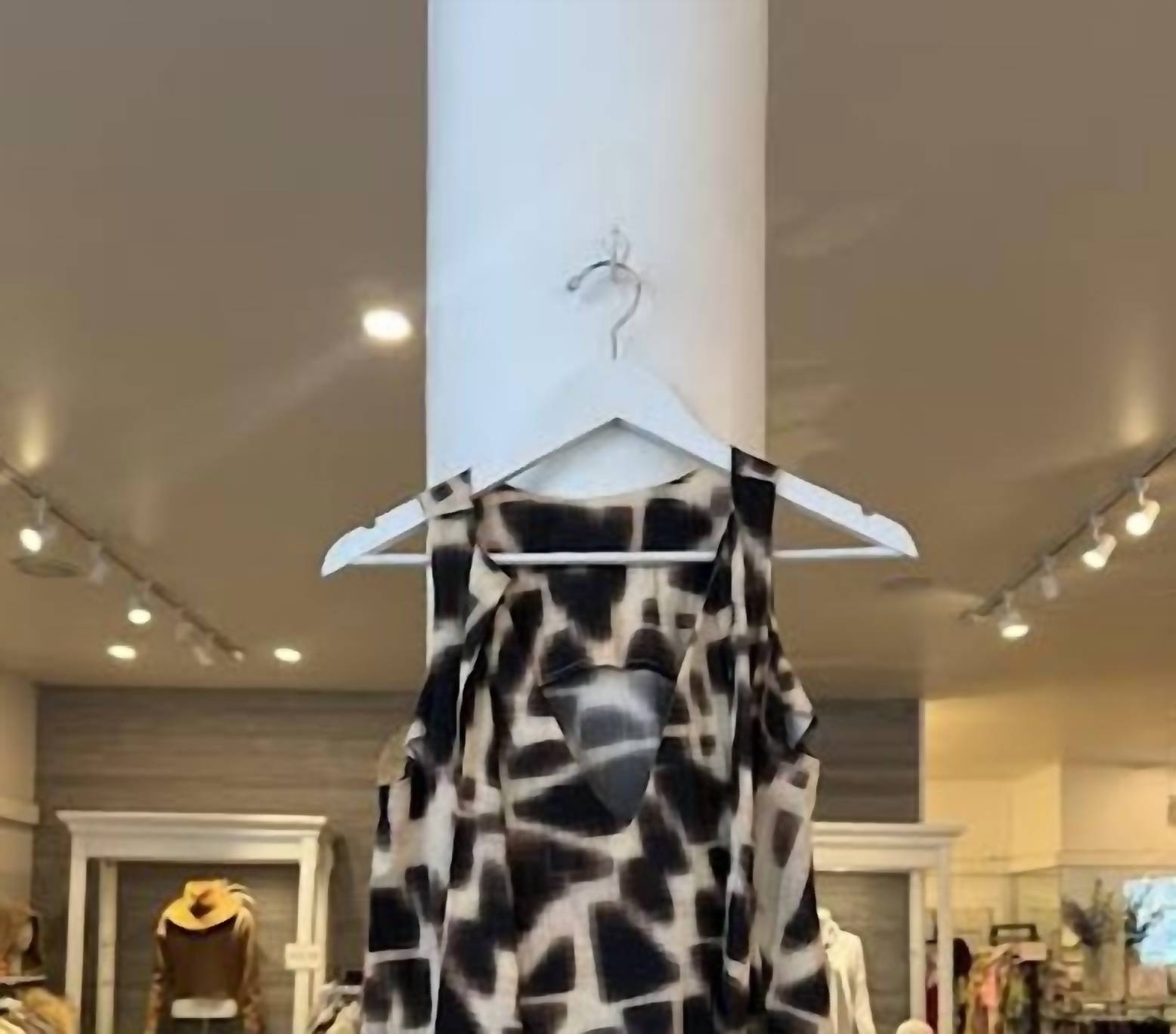 Psophia Women's Sleeveless Blouse in giraffe - women's blouse - detail view