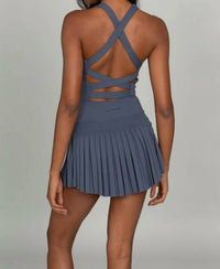 Gold Hinge Criss Cross Back Pleated Tennis Dress in navy - women's dress - detail view