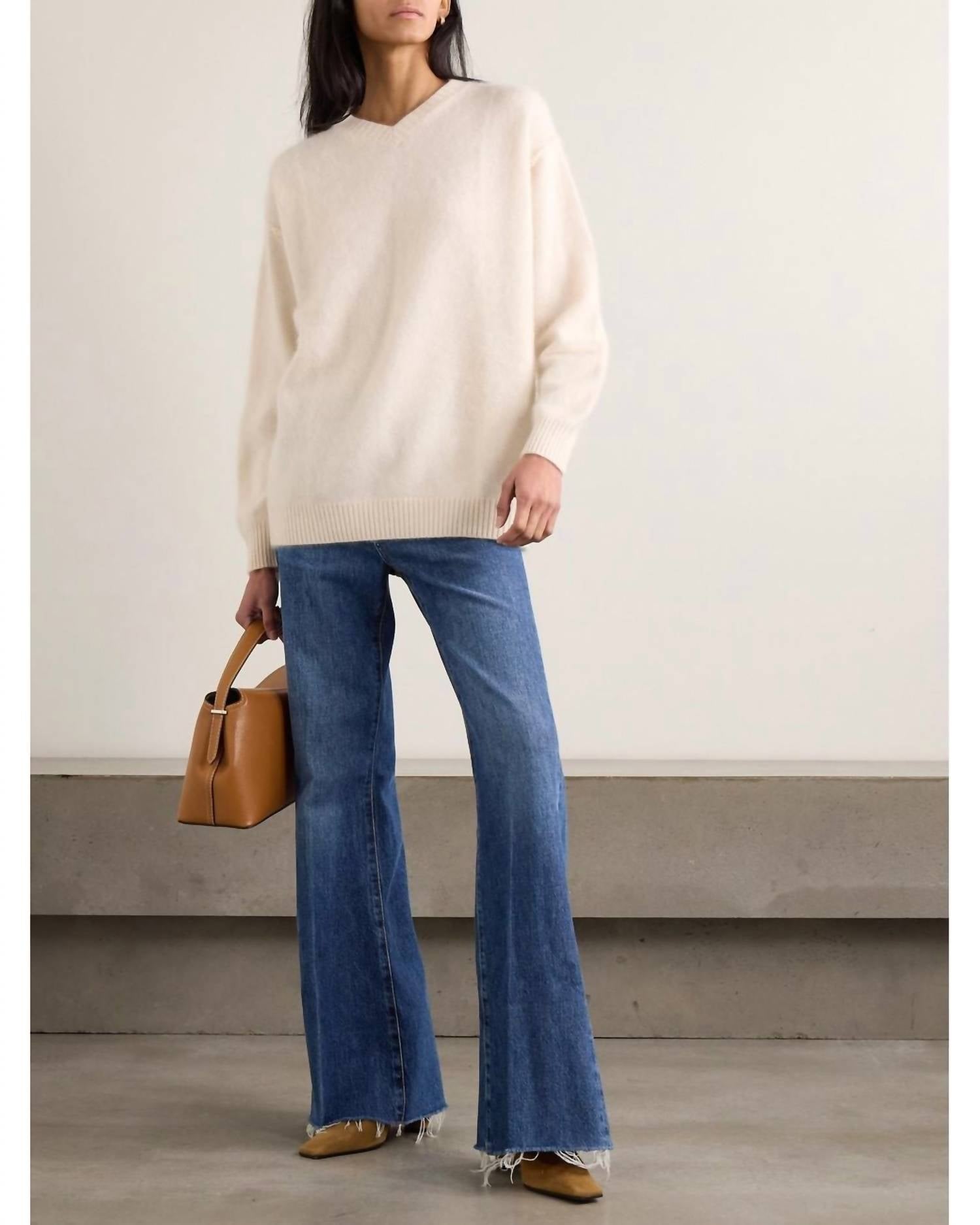 FRAME Lax Distressed High Rise Flared Jeans in antidote - women's jeans