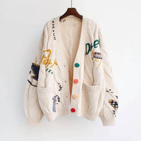 Rosa Clothing Slouchy Embroidered Cardigan in apricot - women's cardigan - detail view