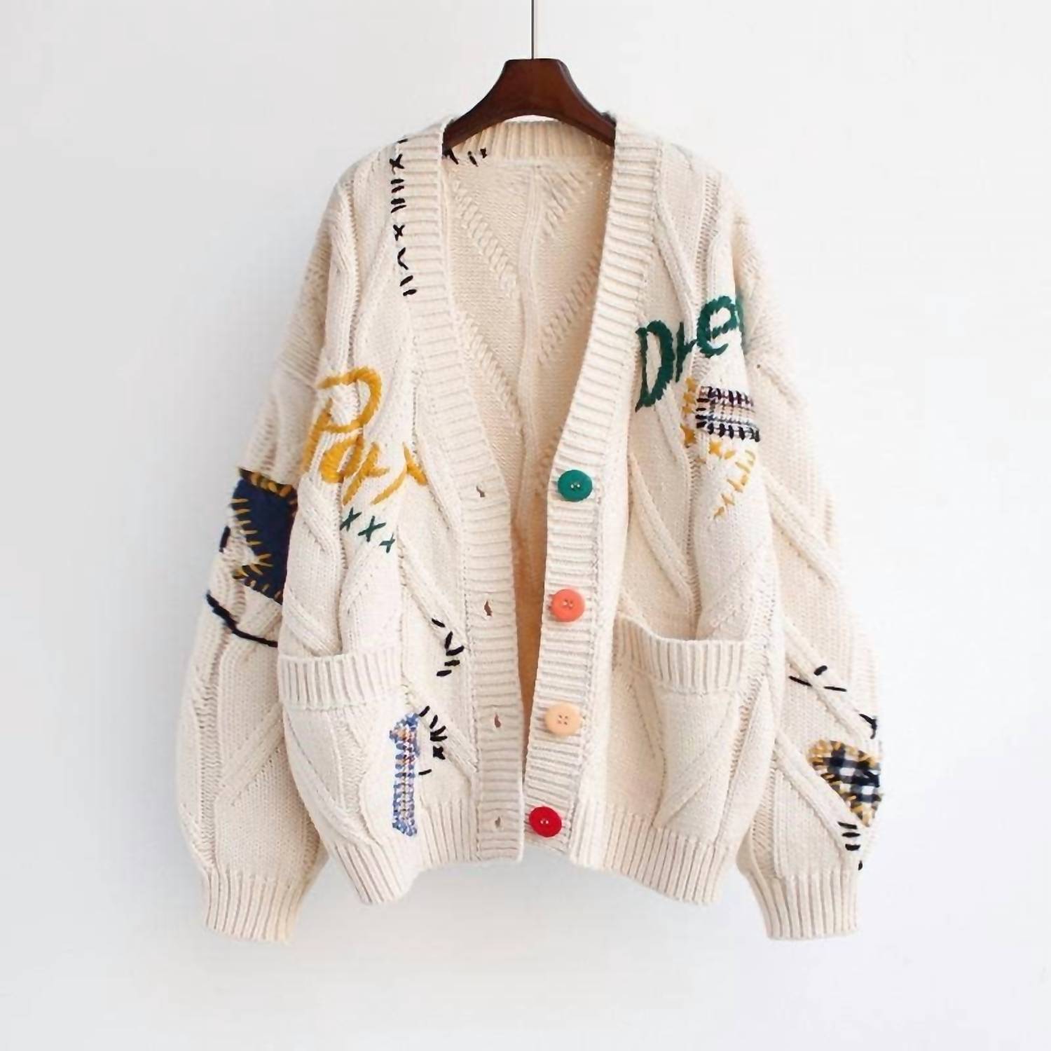 Rosa Clothing Slouchy Embroidered Cardigan in apricot - women's cardigan - detail view