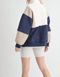 AEMI + CO Colorblock Pullover in blue - women's long sleeve top - detail view