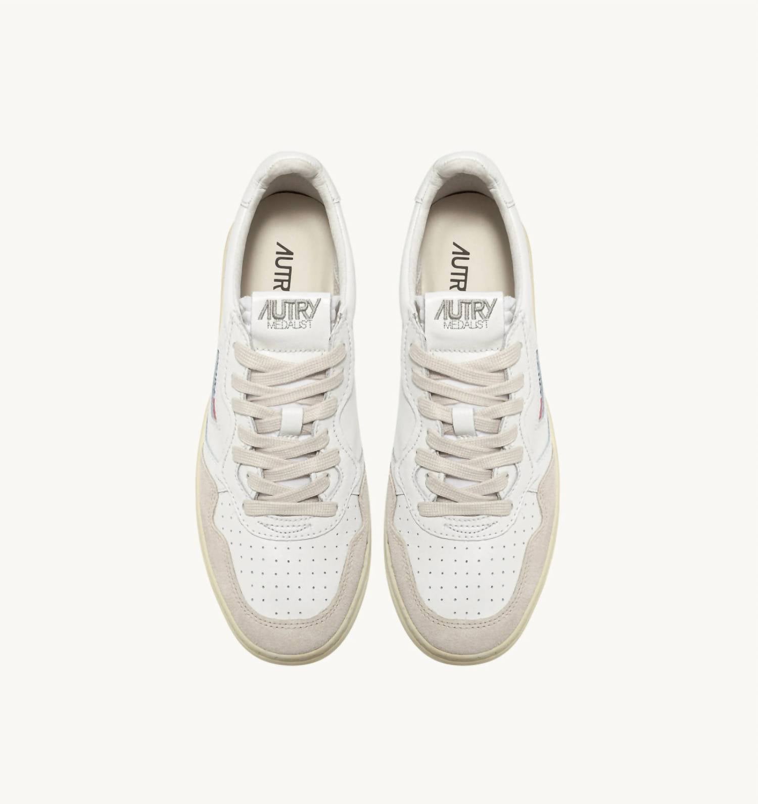 AUTRY Women's Medalist Low Sneaker in white leather and beige suede - women's sneaker - detail view