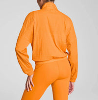 Spanx Get Moving Half Zip Textured Jacket in monarch orange - women's jacket - alternate view