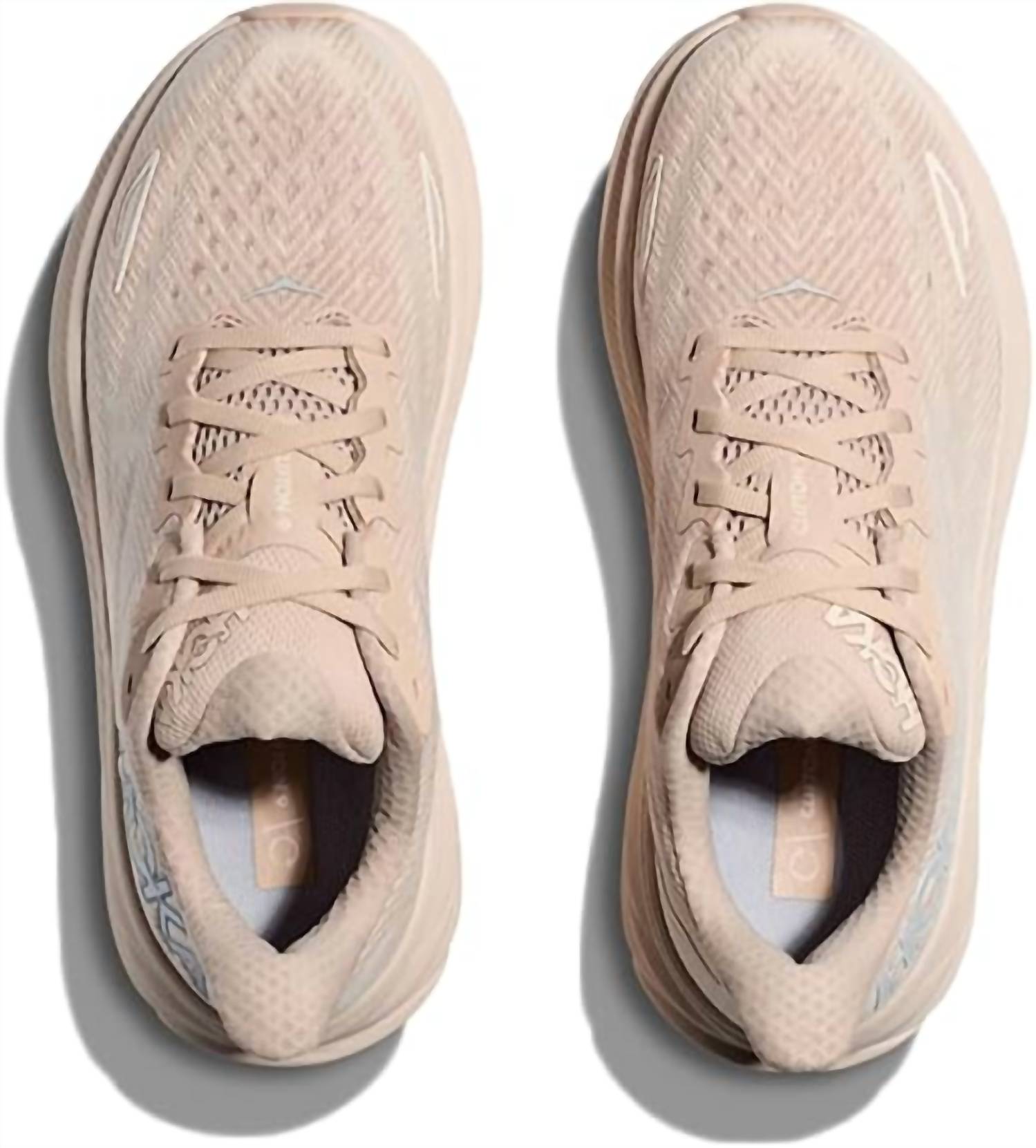 Hoka Women's Clifton 9 Running Shoes in shifting sand eggnog 1 - women's shoe - detail view