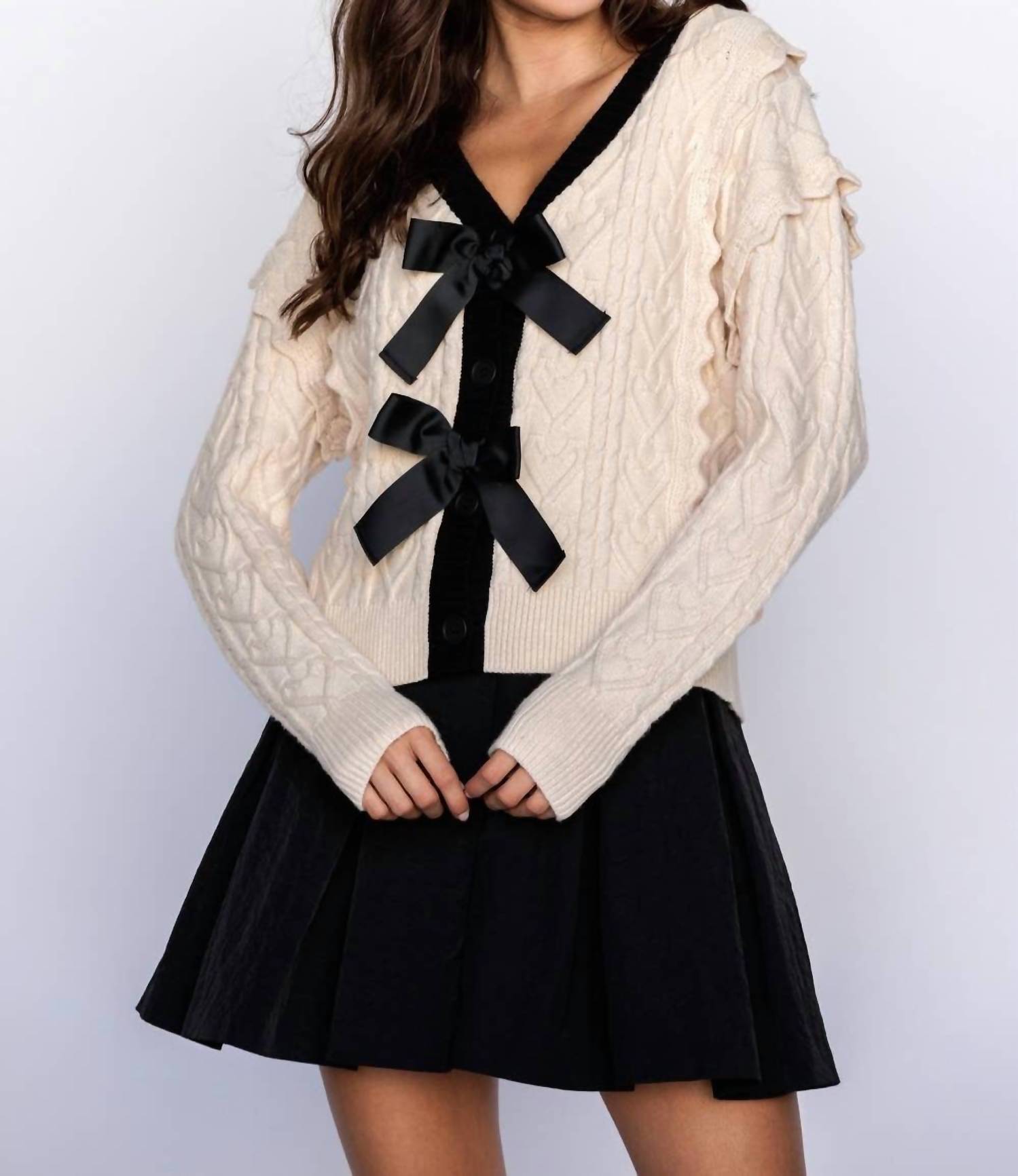 Storia - CABLE KNIT CARDIGAN WITH BOWS