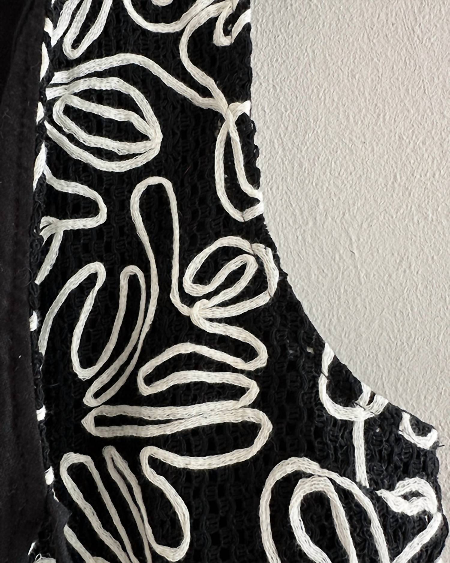 In February - Beautifully Embroidered Knit Vest